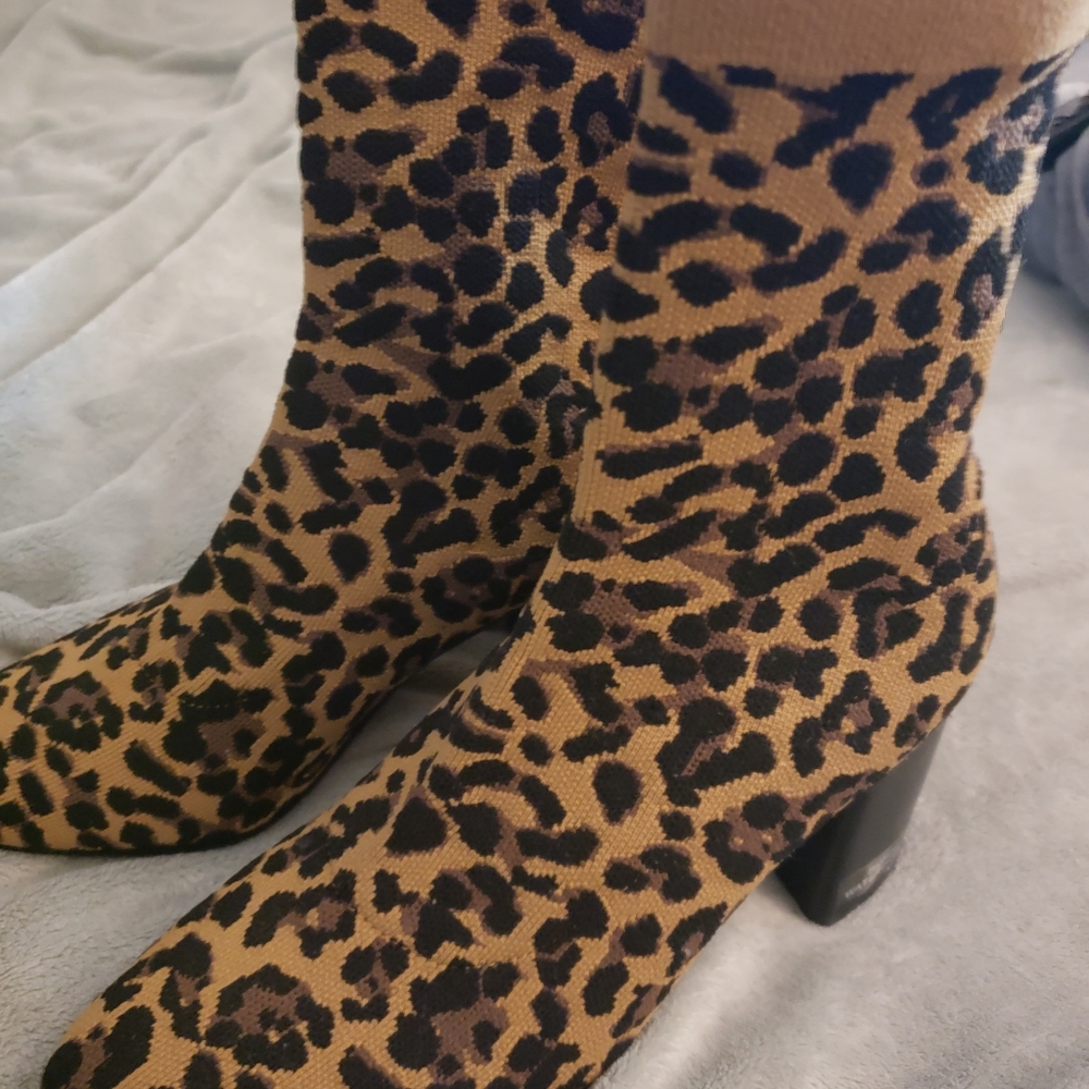 NWT sock leopard bootie from Dillards..I have one too many pair of leopard boots